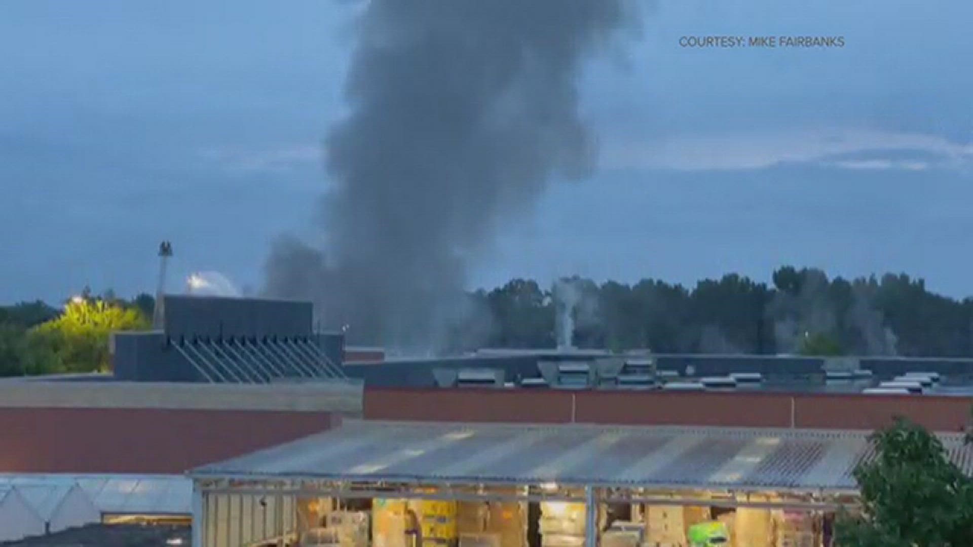 Crews are working to contain a fire at the Walmart in Peachtree City Wednesday evening.