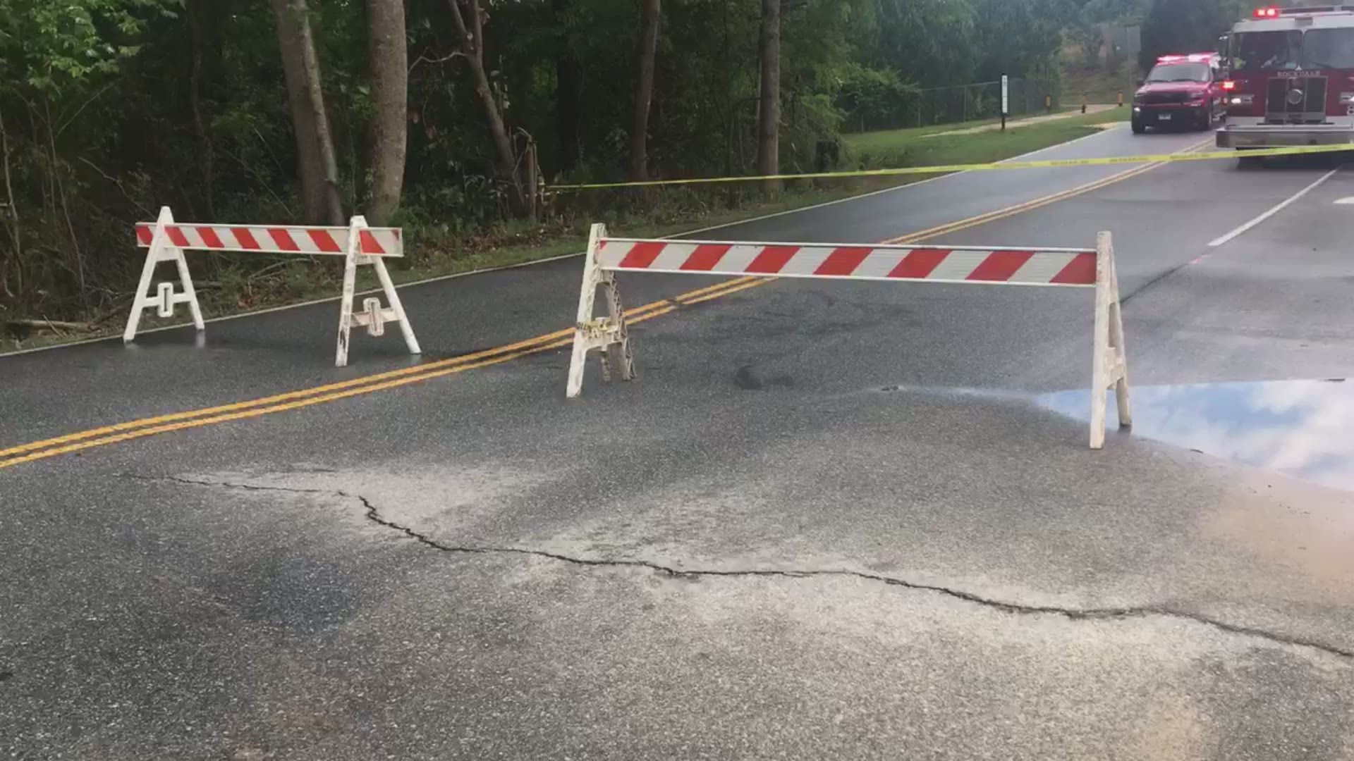 The sinkhole on Rowland Road is located between Rockdale County High School and Magnet School, a busy area for families. Police said the sinkhole has continued to grow since it opened up.