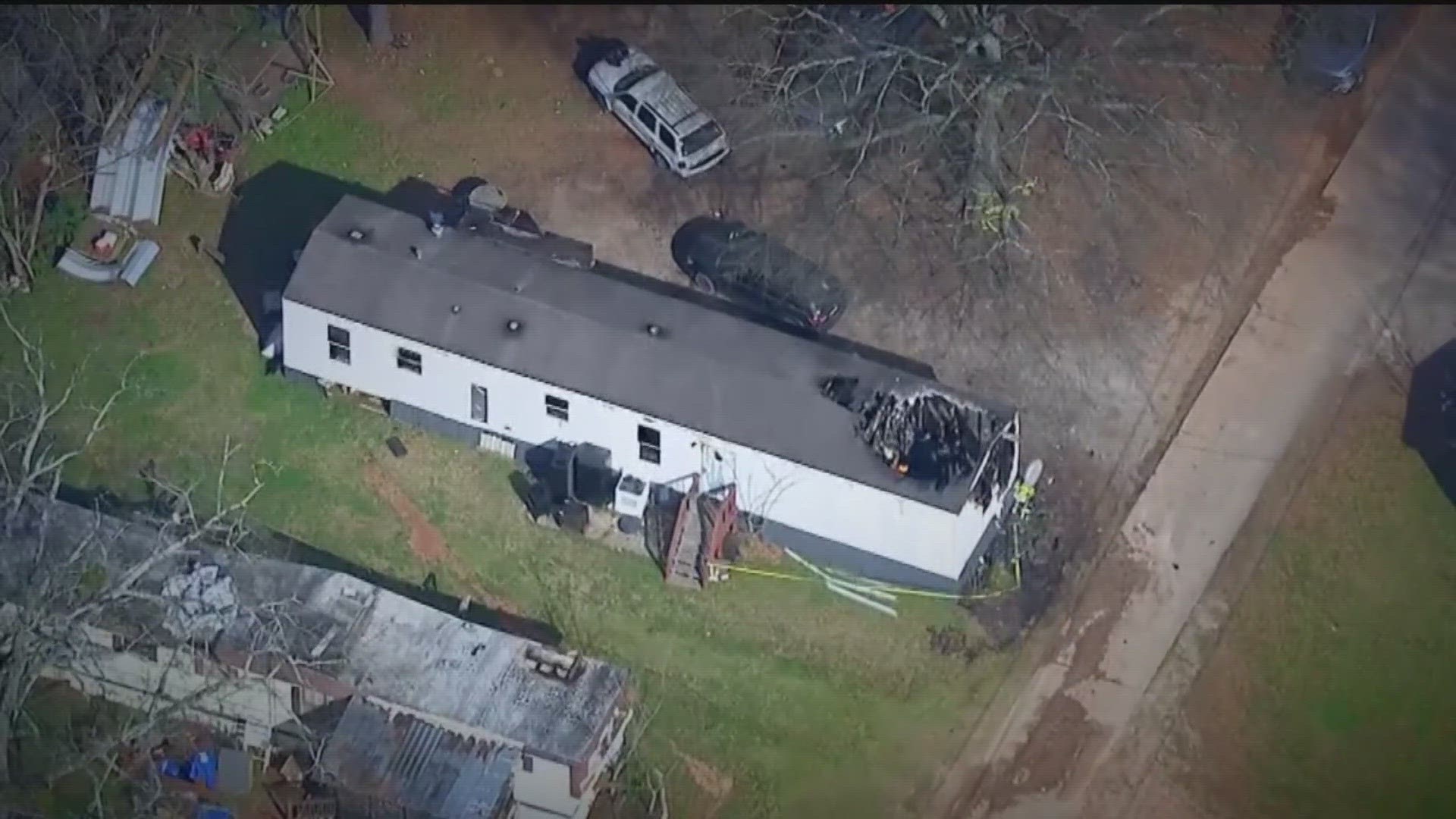 The fie broke out at home behind the Spalding County Fire Department's Woodroof station.