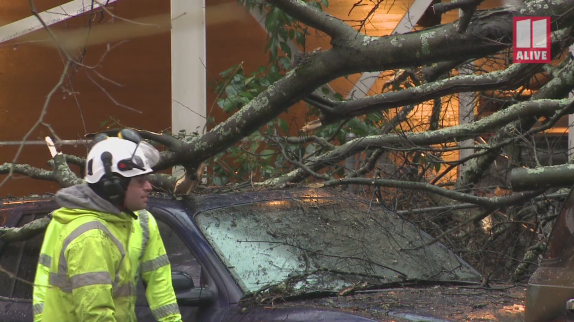 Officials said six cars were damaged or blocked by fallen trees Wednesday morning at an Emory University parking deck. No injuries were reported.