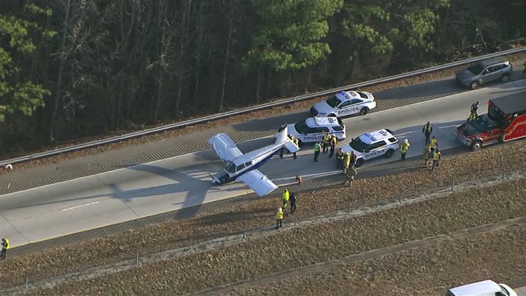 Plane makes emergency landing, clips semi-tractor trailer in I-985 in Gwinnett County, authorities say