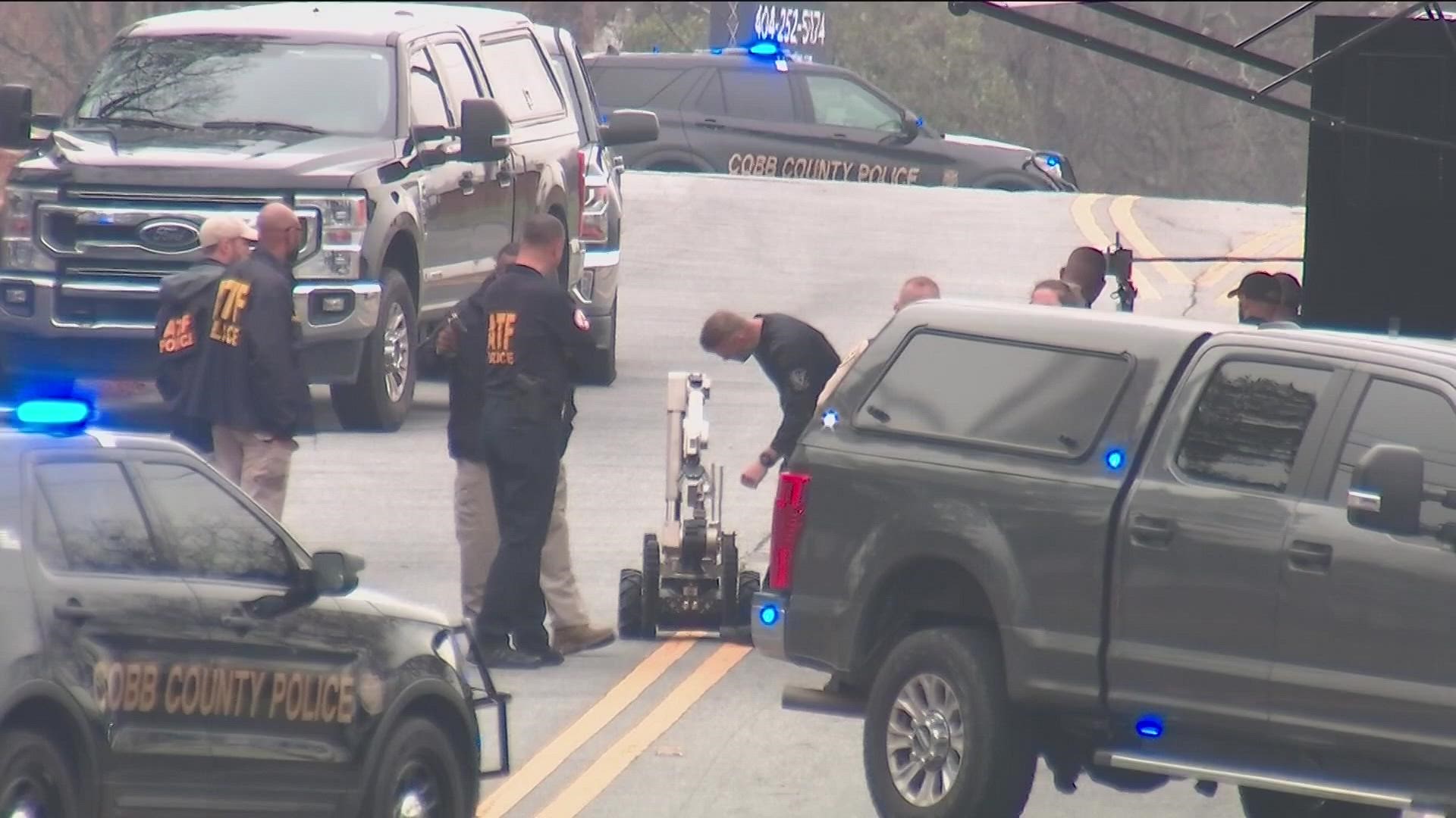 Around noon, bomb squads removed the alleged pipe bomb from the truck.