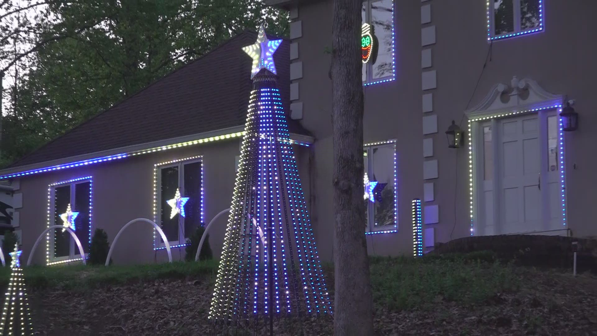 A family in Cumming has made good use of their down time, offering a high-tech light display that would usually be in storage this time of year.