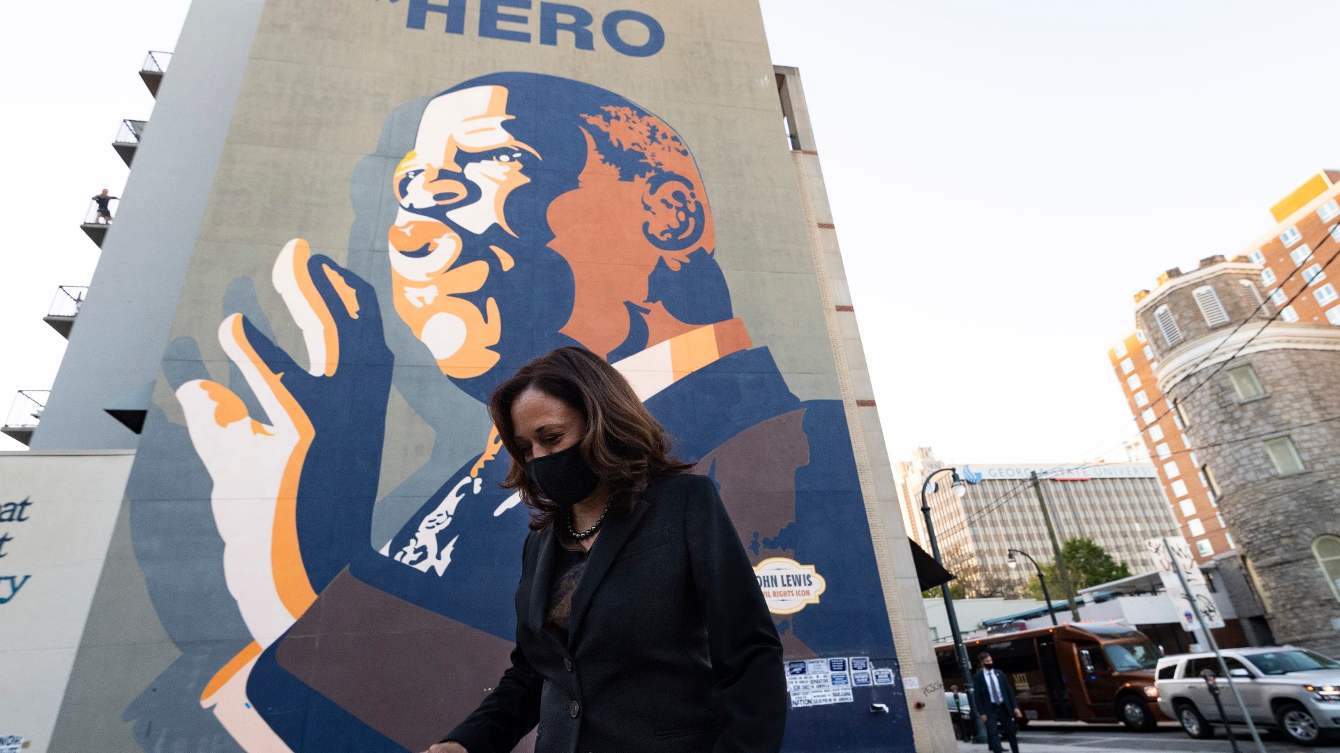 Sen. Kamala Harris took a moment to pay respects to the late-Congressman John Lewis at his towering mural during her visit.
