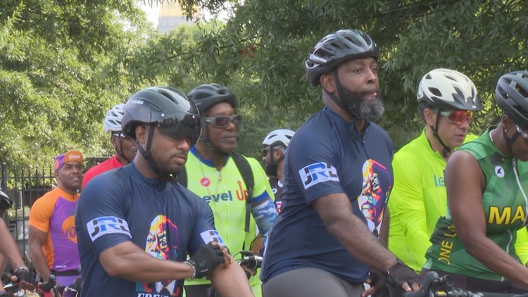 Cyclists take over Atlanta's streets to honor the late Congressman John Lewis