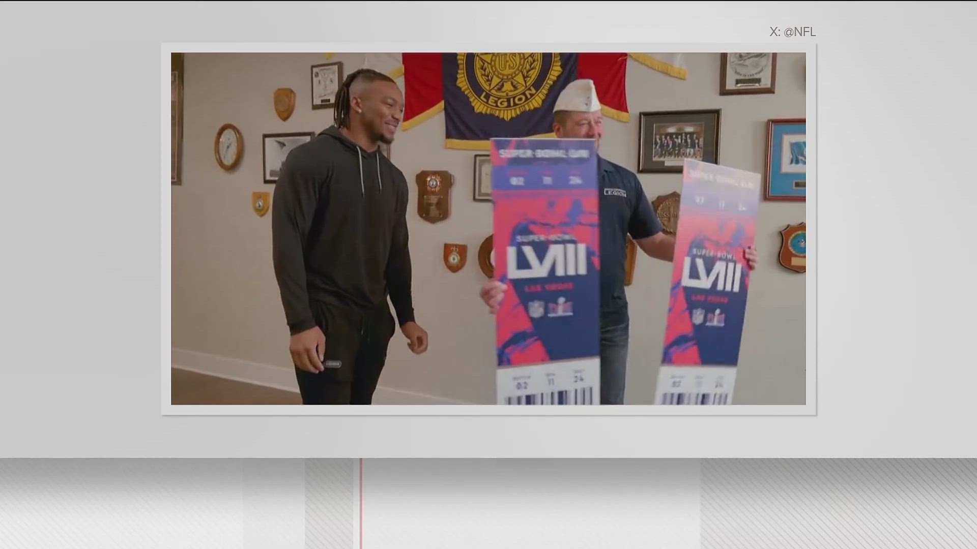 Running back Bijan Robinson teamed up with USAA and The American Legion to surprise Marine Corps veteran Mark Cauble with two tickets to the big game.