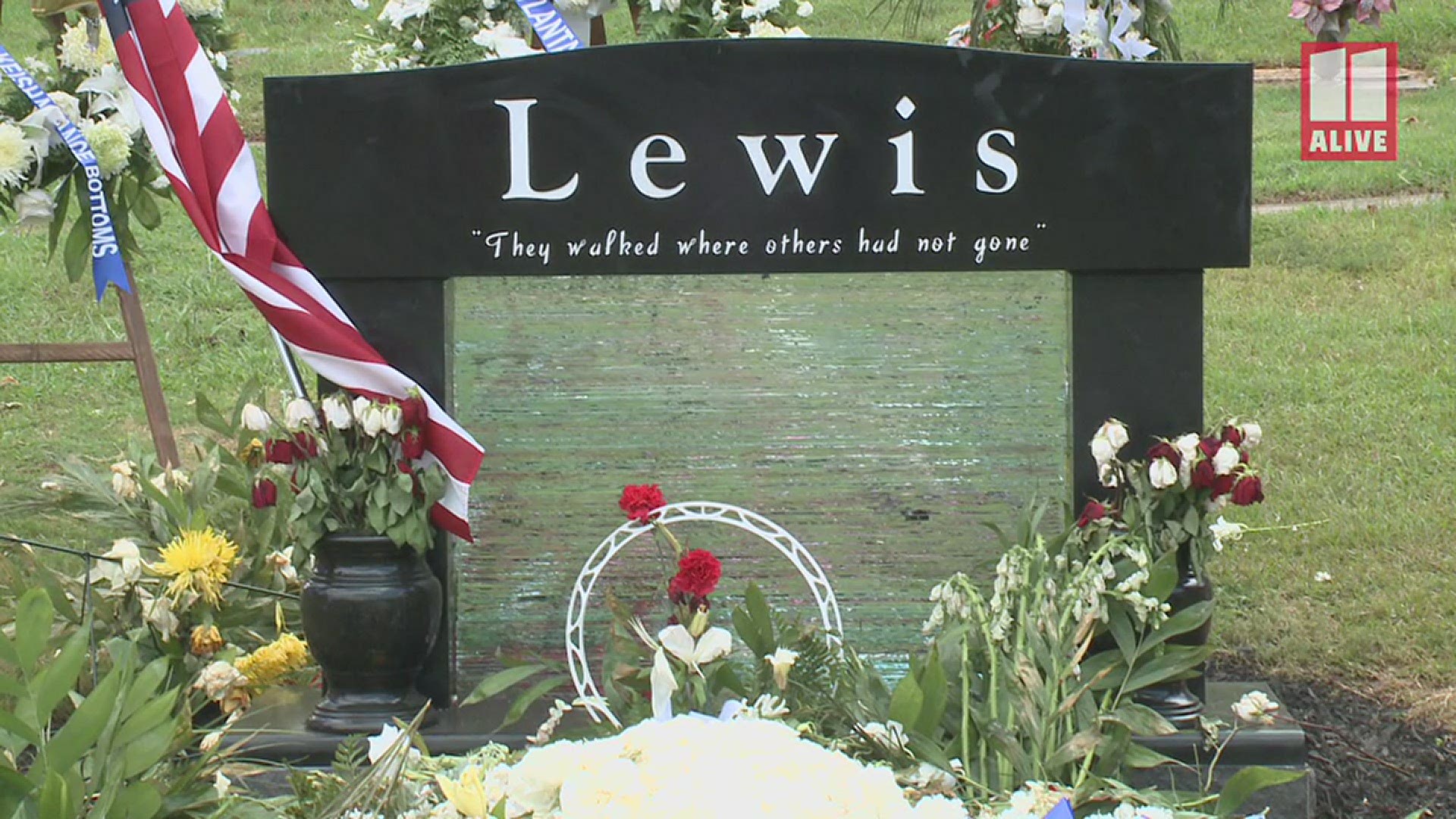 Flowers on John Lewis' grave at South-View Cemetery in Atlanta ...