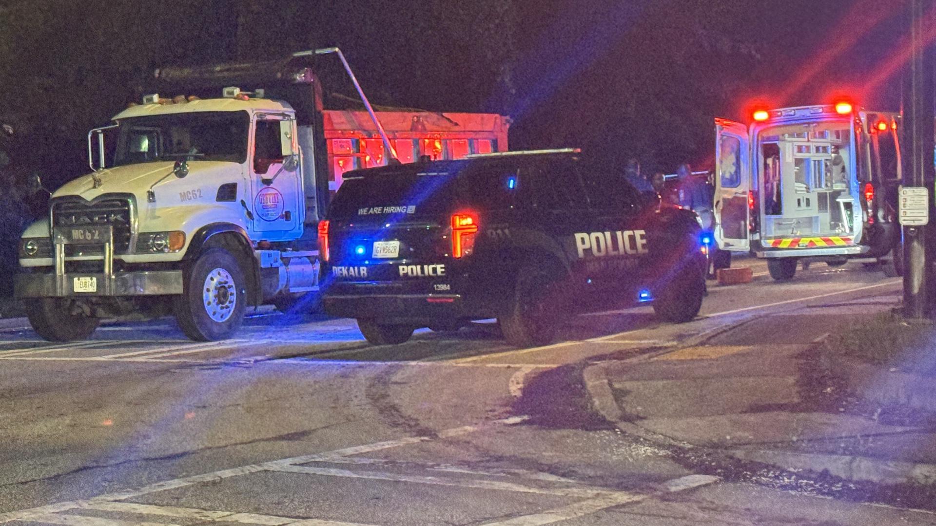 DeKalb officer hospitalized after crash with dump truck | 11alive.com
