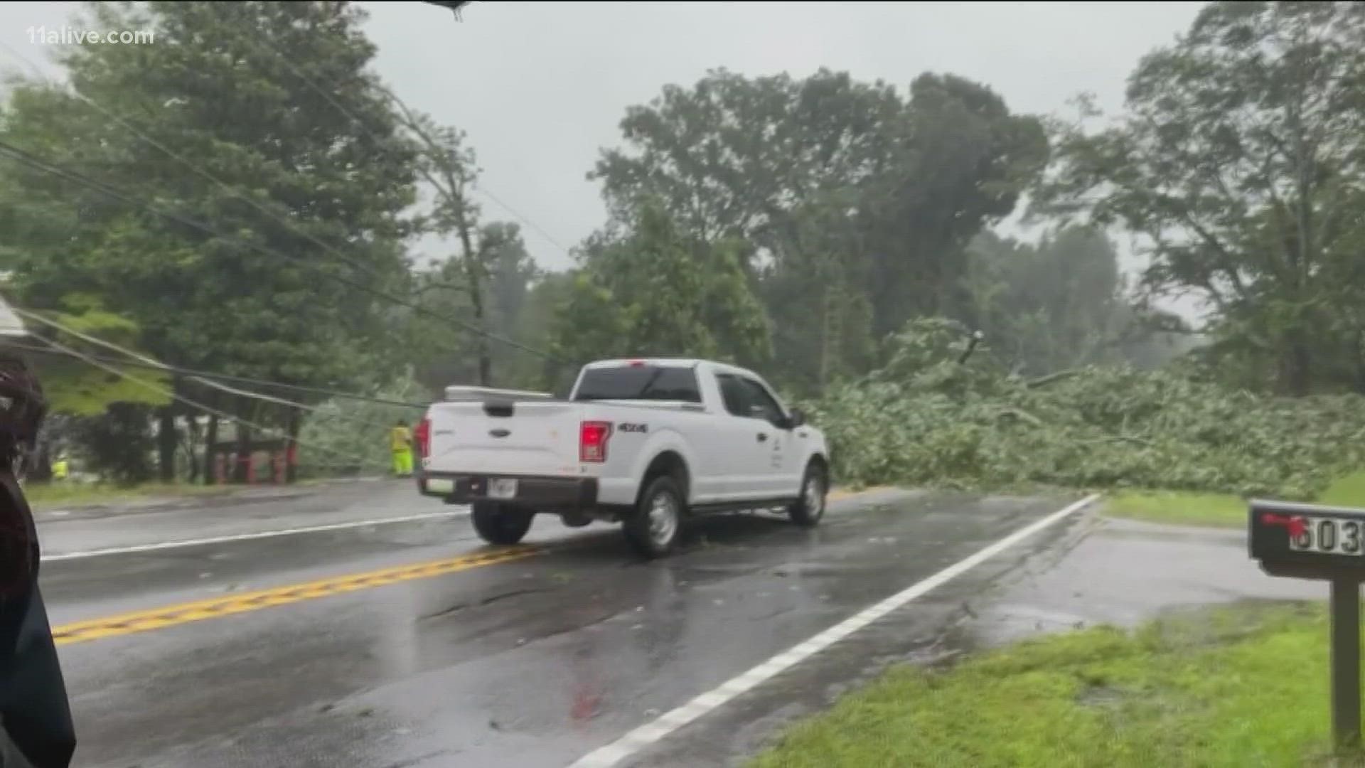 Tropical Depression Fred is leaving damage across the area, including trees down and power outages.