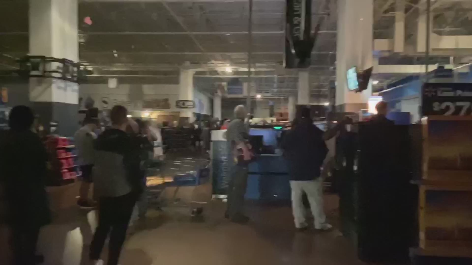 A blackout at the Walmart on Howell Mill has forced the store to evacuate amid major storms.