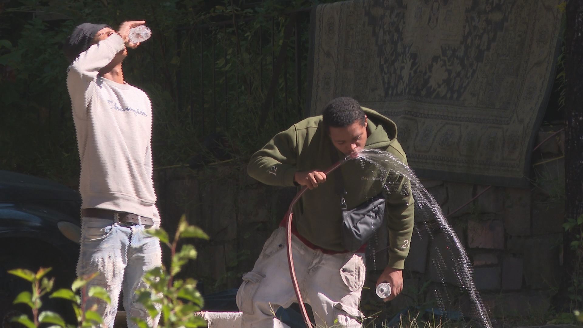 Some residents at DeKalb condominiums resort to drinking from water hoses, cooking over fires amid water, power outages