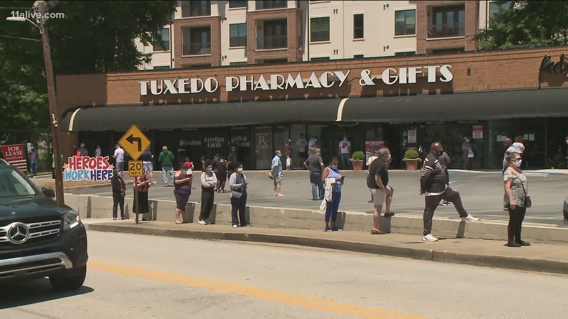 People stood in a line waiting to get tested at this mobile site