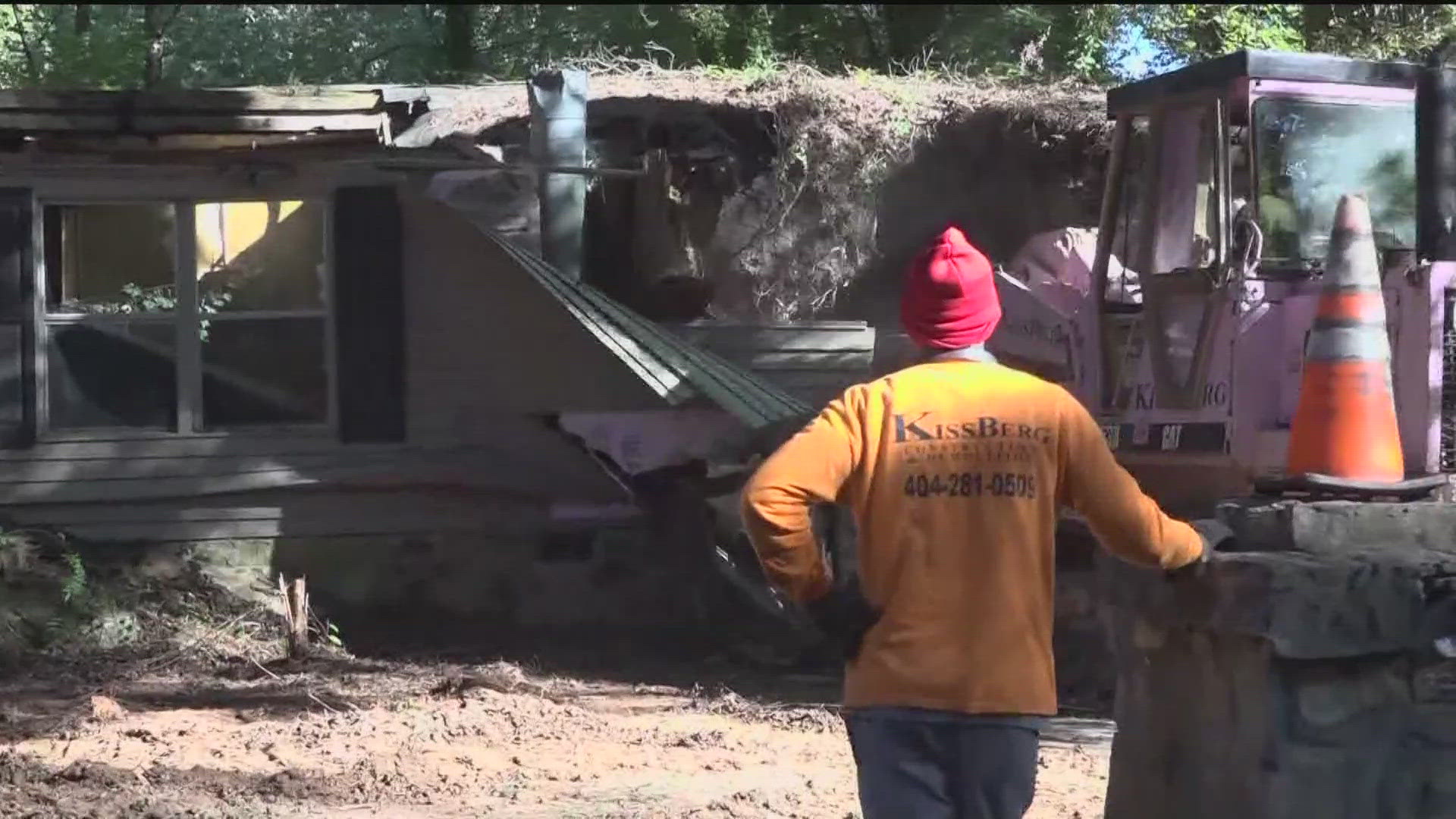 In a step towards revitalizing neighborhoods in DeKalb County, officials tore down a blighted home this afternoon.