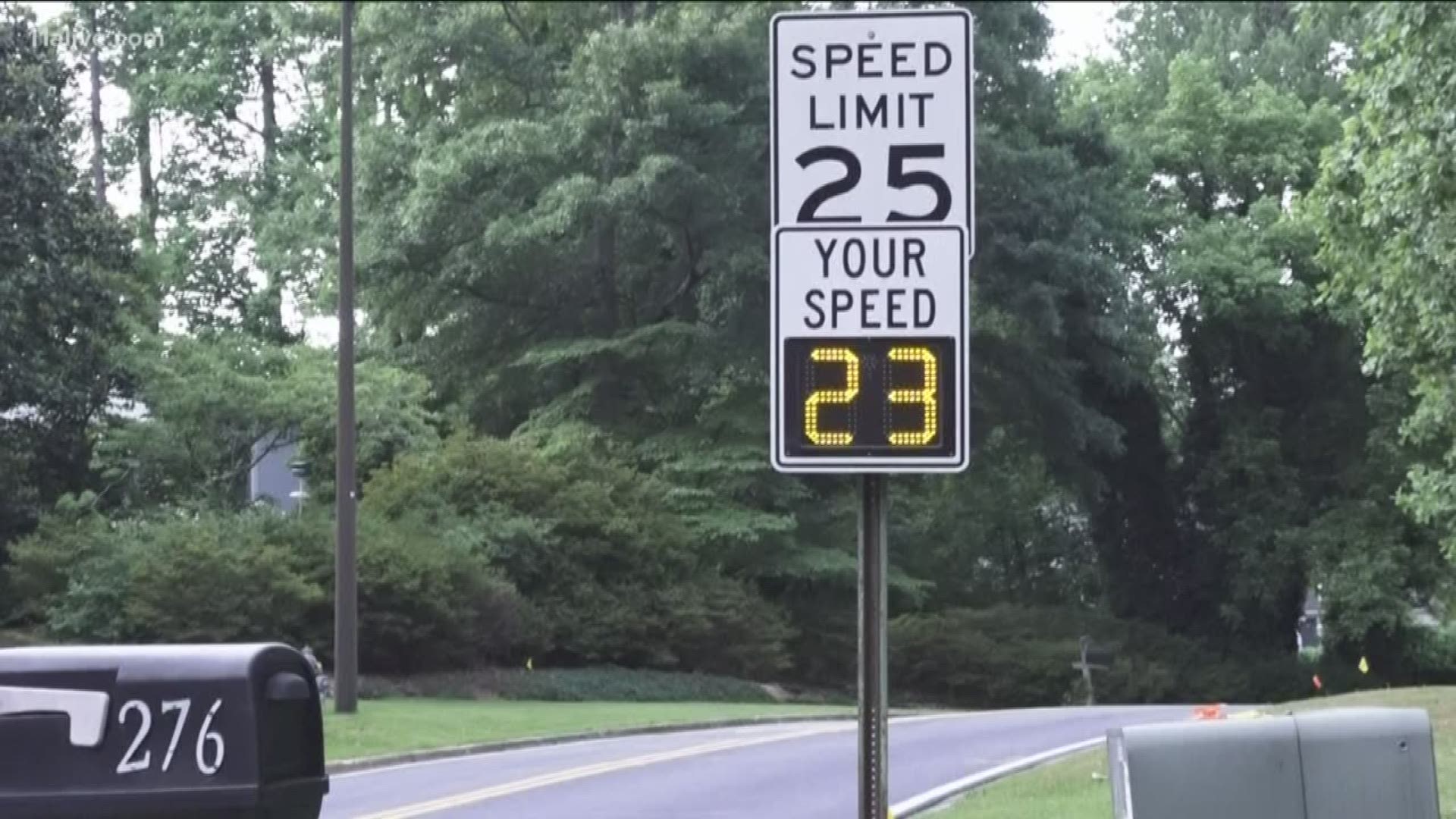 A man fed up with speeders put four bright signs in his yard that said "Slow the F Down." A month later, a speed sensory device was installed by police.