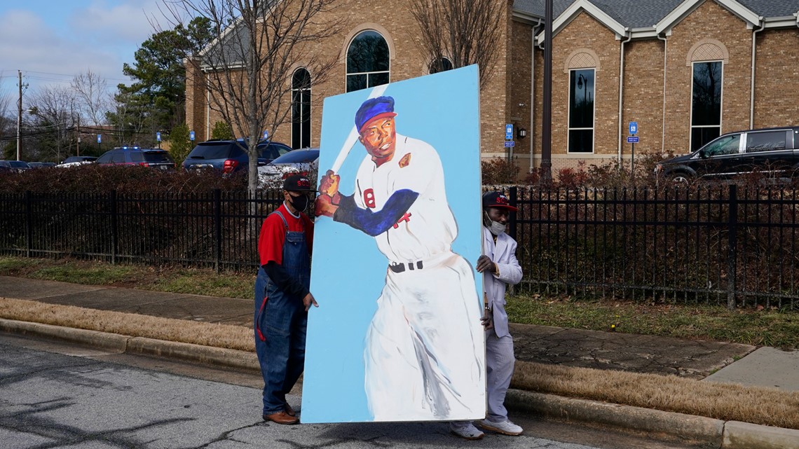 Hank Aaron hearse stops at homerun marker to South View Cemetery