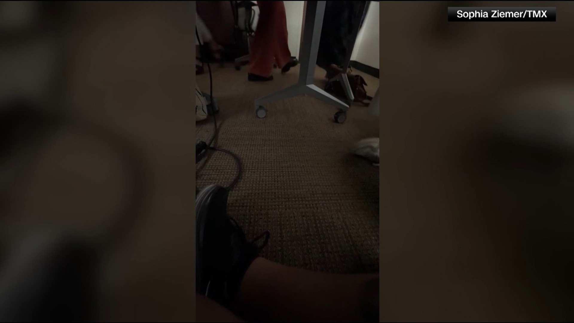 Video via CNN Newsource - A group of distressed Florida State University students taking cover beneath tables and chairs.