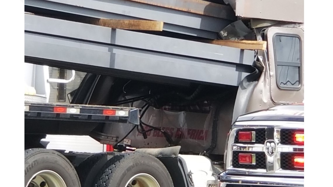 Steel beams crash through truck's cab, killing driver