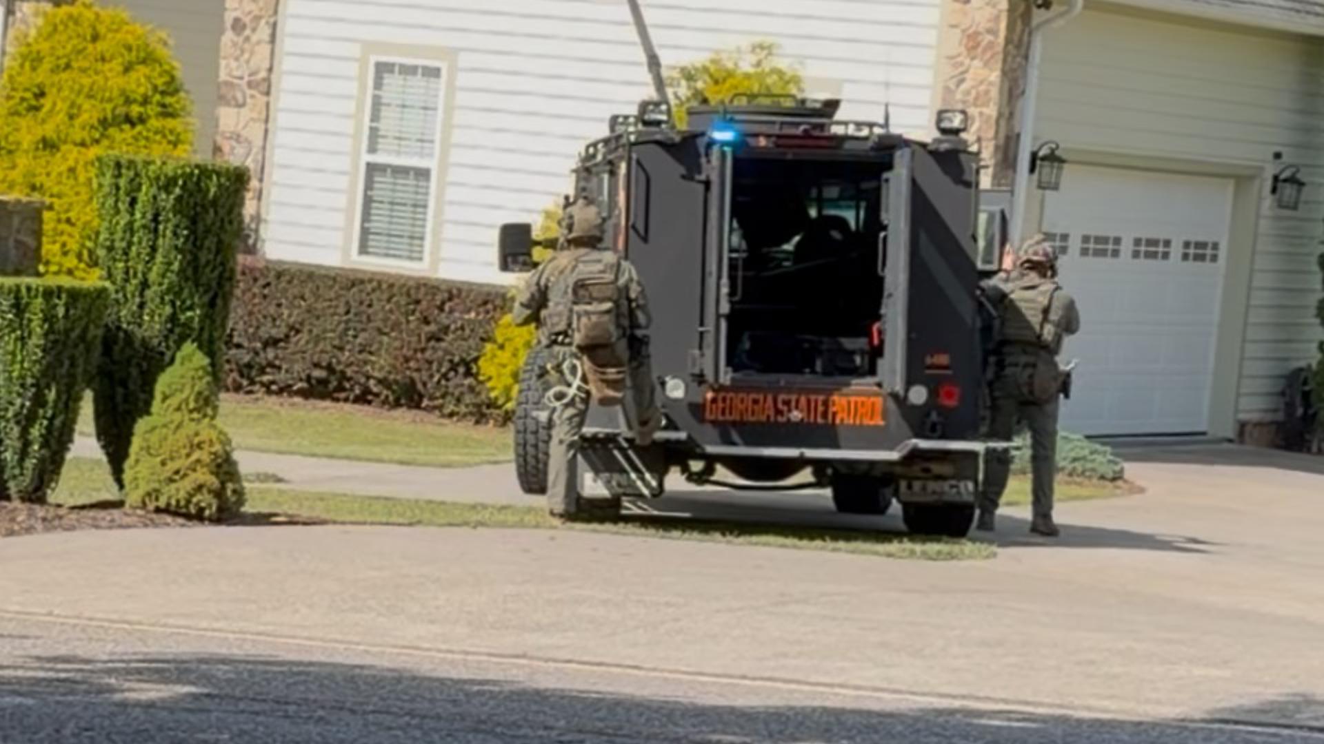 Child safely recovered, suspect in custody after barricade SWAT ...