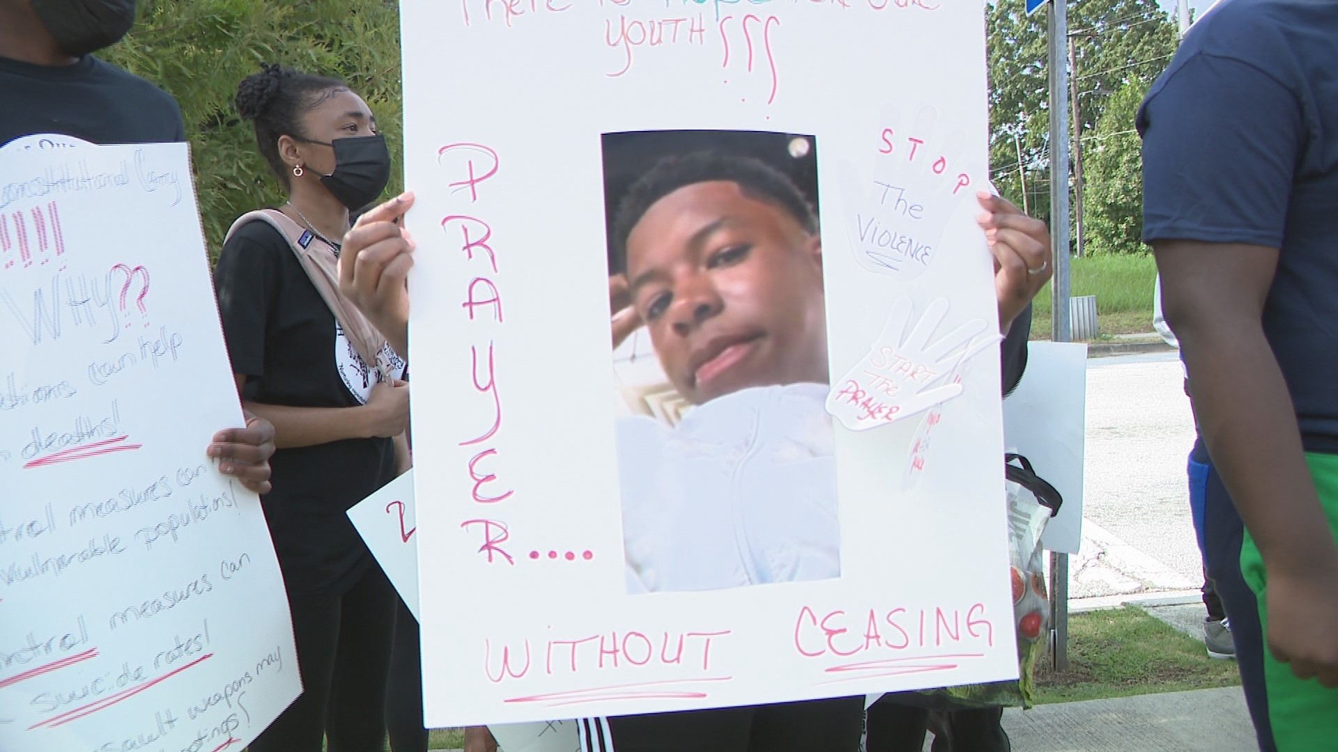 A group of activists, including mothers who lost their children to violence, gathered at the Juvenile Court to kick off the march to Cleophs Johnson Park.