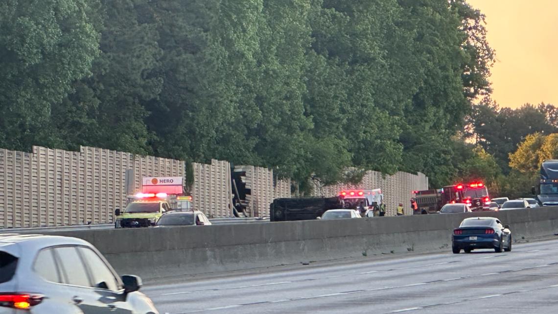 Ambulance transporting patient flips over in crash on I-285 in DeKalb ...