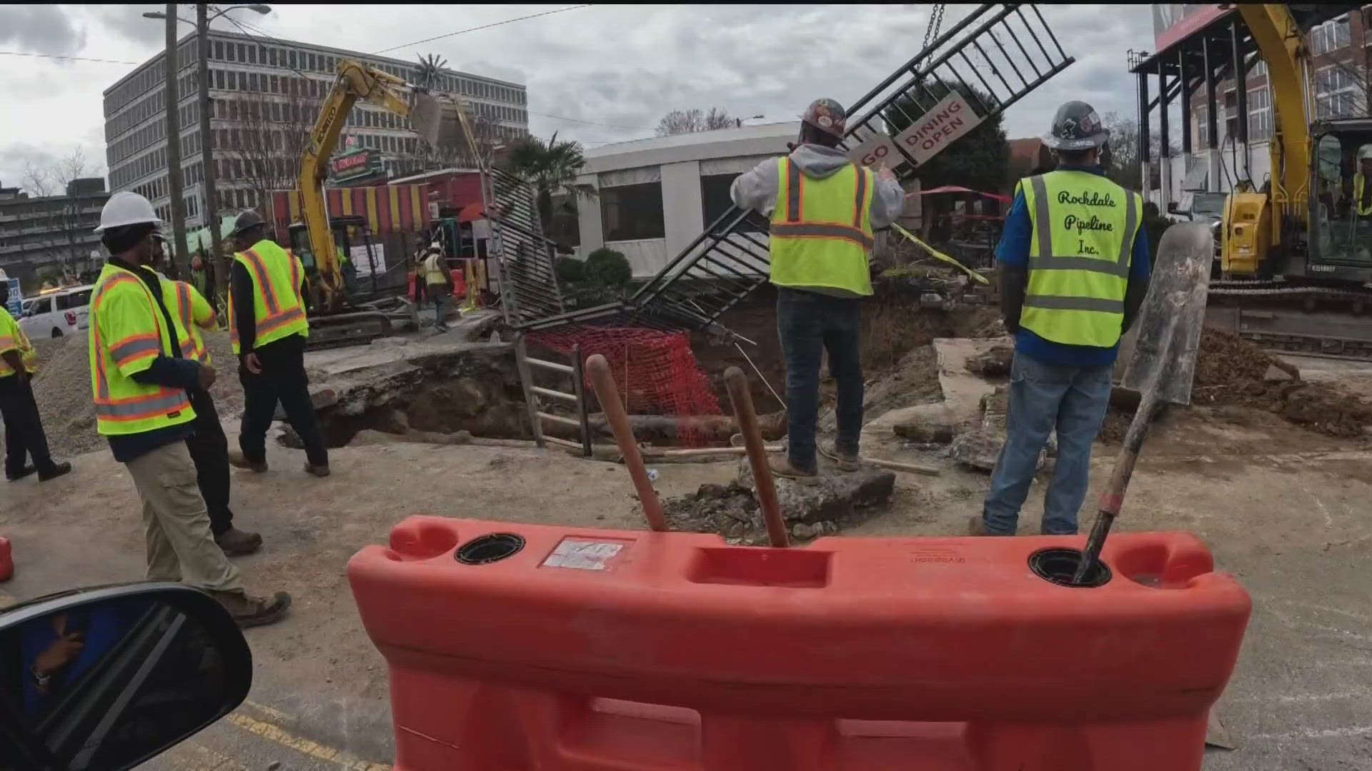 Several Buckhead businesses temporarily closed their doors Monday night due to a sinkhole along Peachtree Street.