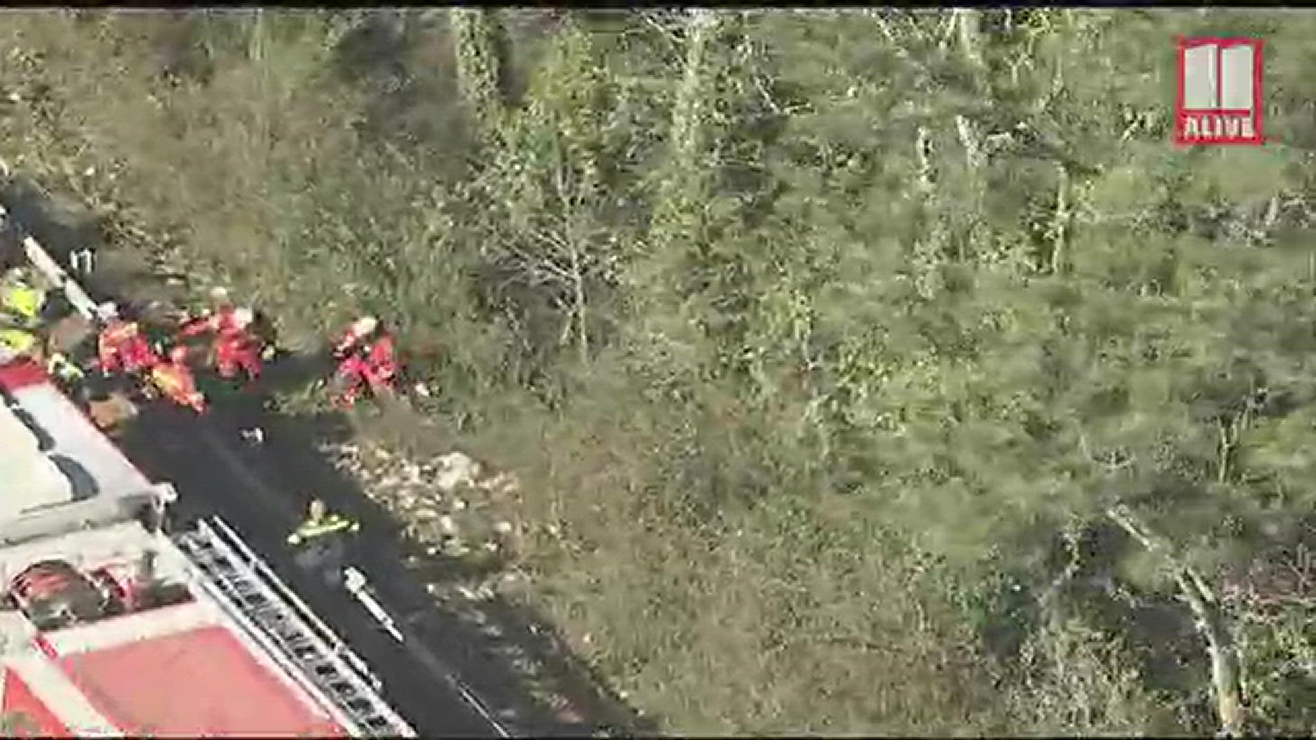 Law enforcement officers are on the scene of a single-vehicle crash near the ramp to I-75 North from the Canton Connector.