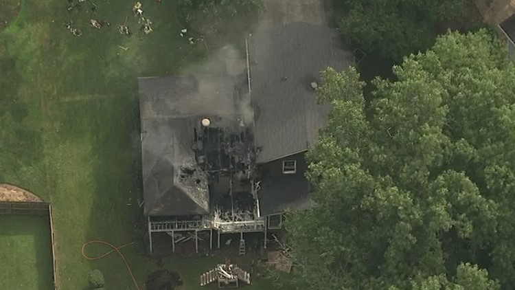 Resident hurt after being forced to jump from second-story window to escape flames at home, DeKalb Fire says