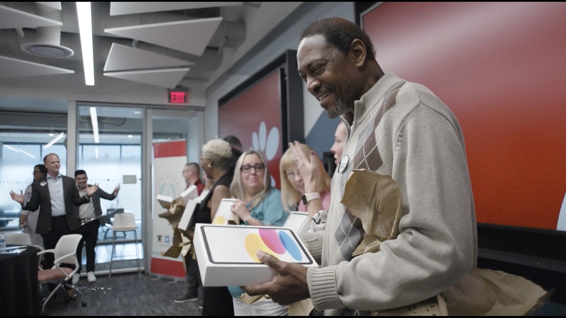 Ples Davis was among nine other educators who received a $10,000 donation to their school and an iPad.