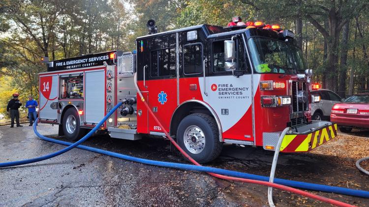 Crews battle massive business fire near Buford