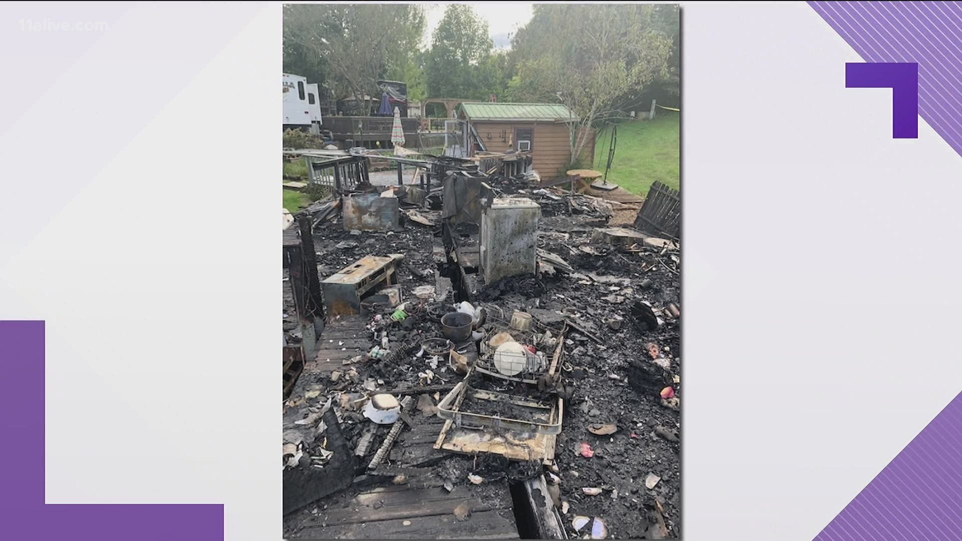 The explosion, officials said, happened when the woman and her husband tried to turn on the gas and ignite the kitchen stove. Neighbors pulled them from the fire.