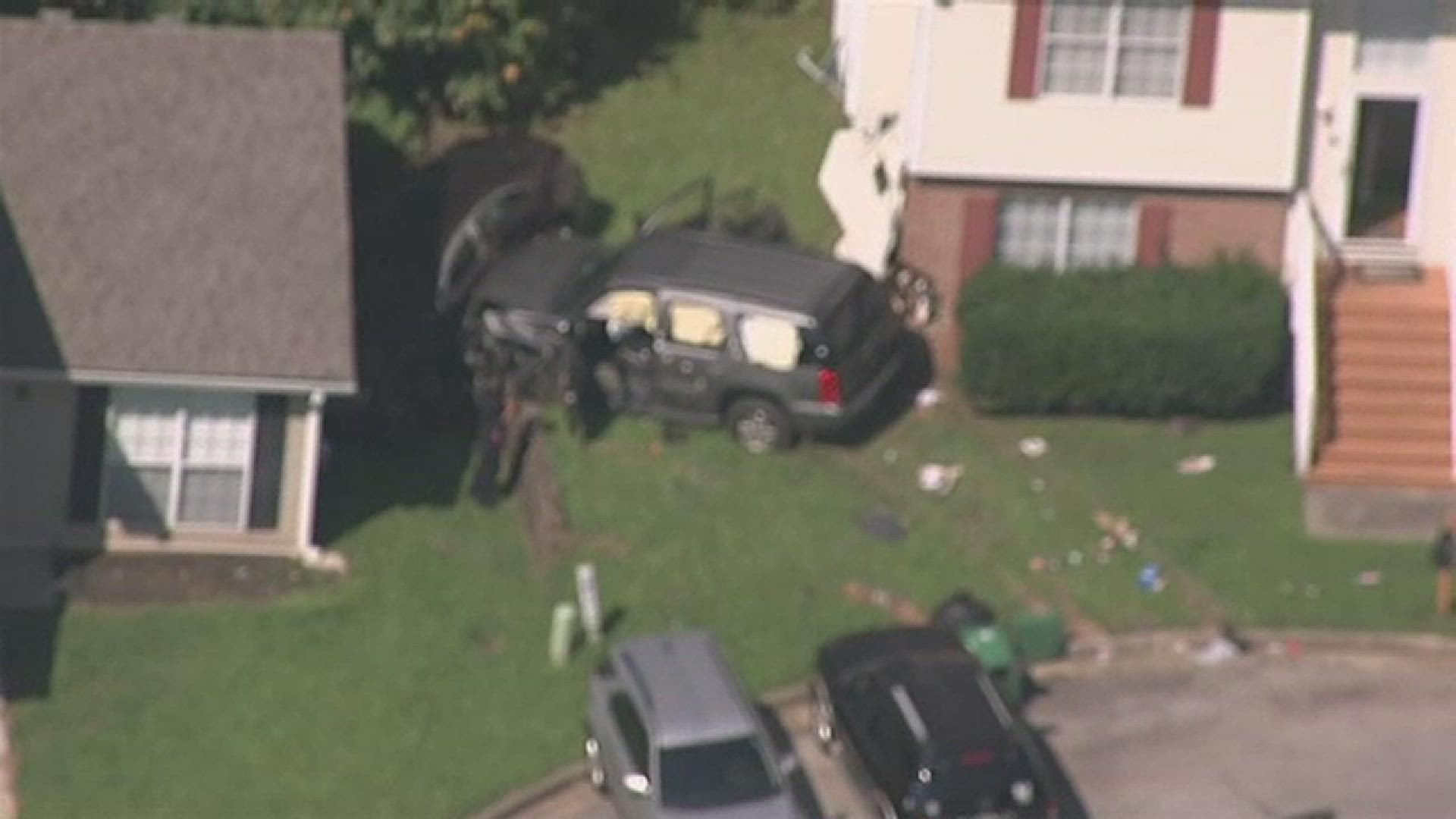 A second car also crashed into the home as well.