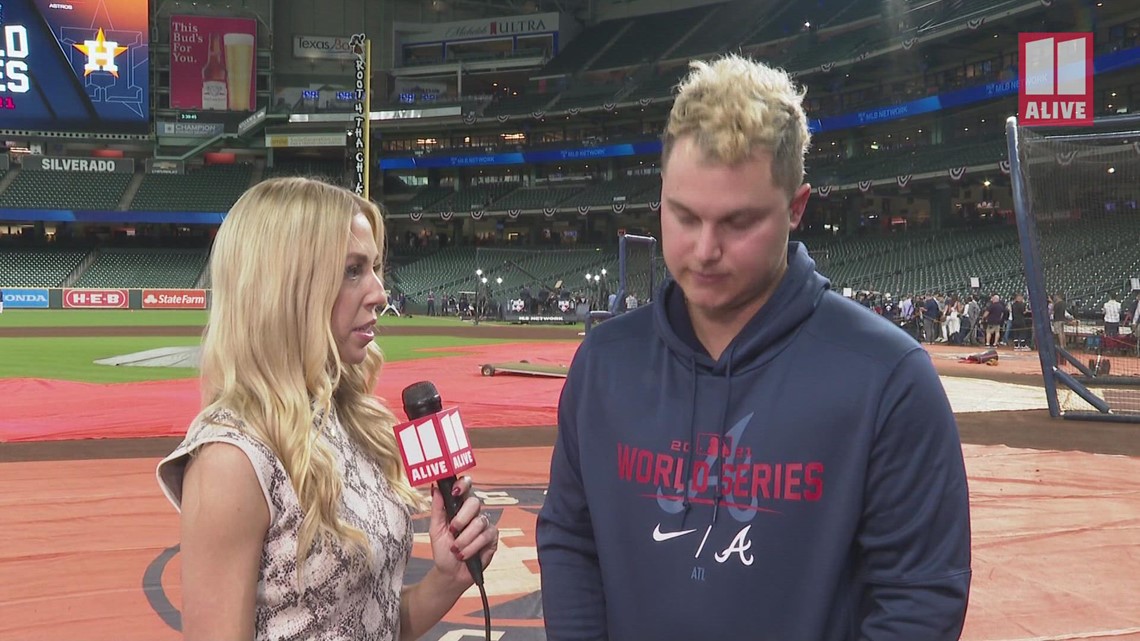 Braves' Joc Pederson celebrates NLCS win with glass of wine on field