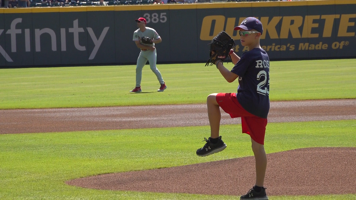 Racine mom, breast cancer survivor throws first pitch at Brewers