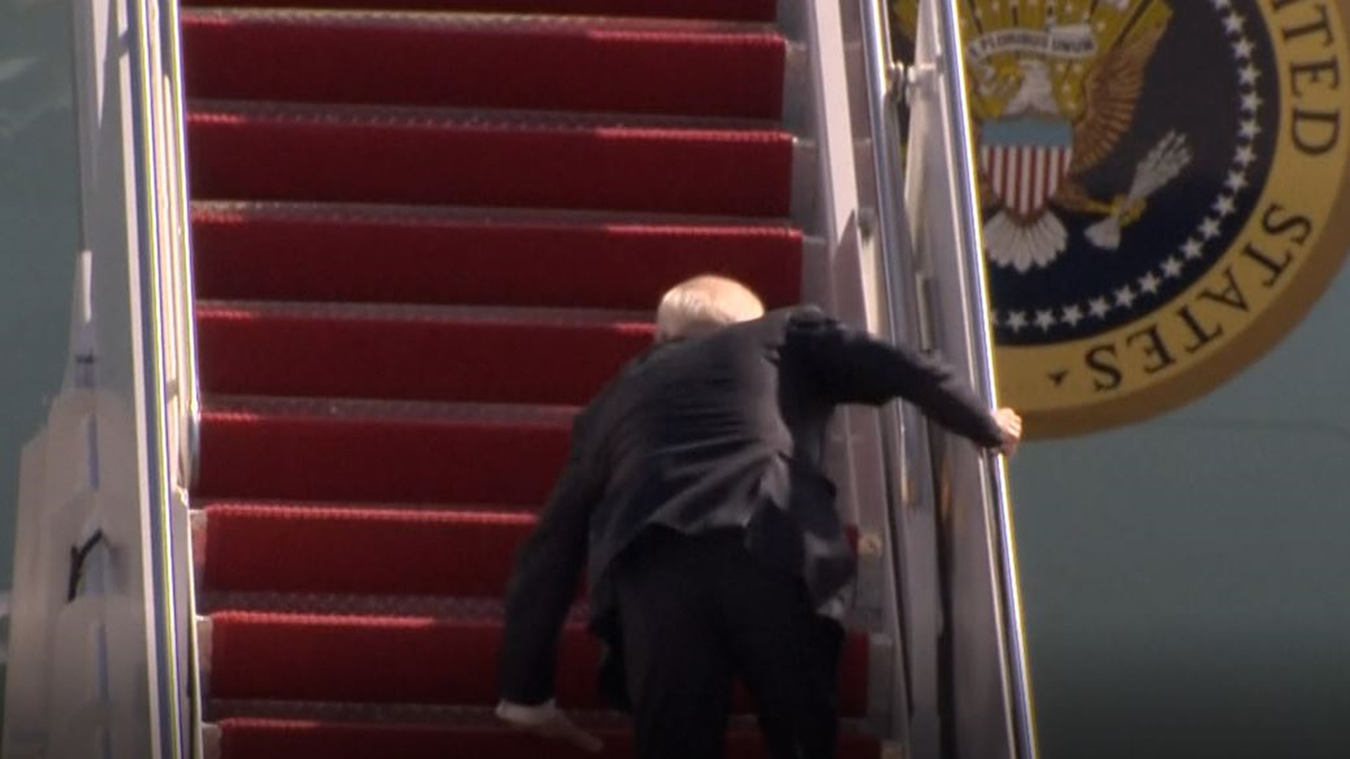 President Joe Biden stumbled up the steps to Air Force One as he departed Joint Base Andrews en route to Atlanta, Georgia.