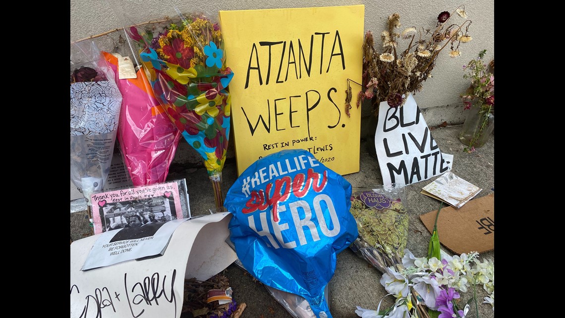 John Lewis mural unveiled over Atlanta skyline