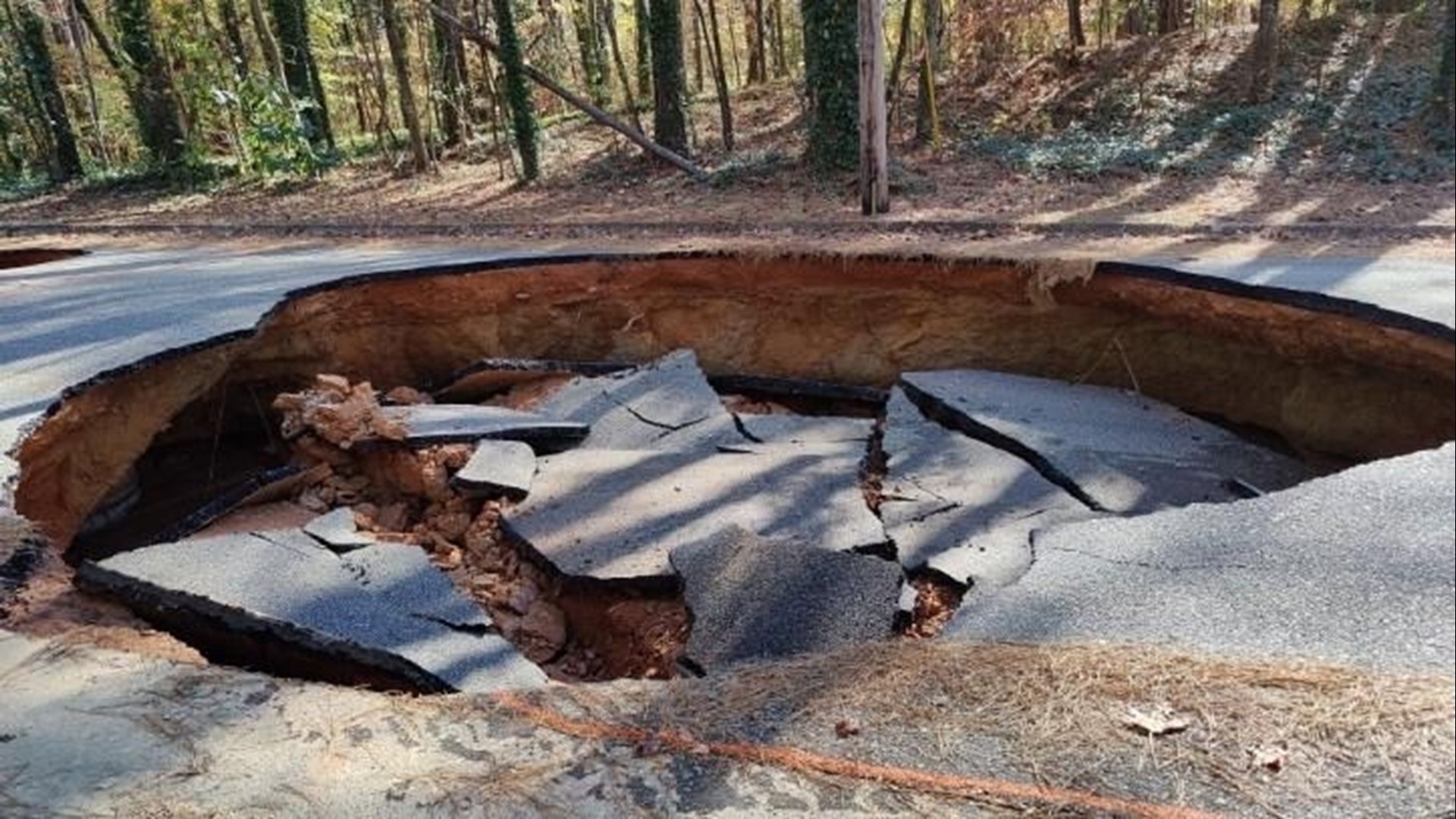 A water main break caused two large sinkholes Thursday morning, essentially swallowing a large truck.
