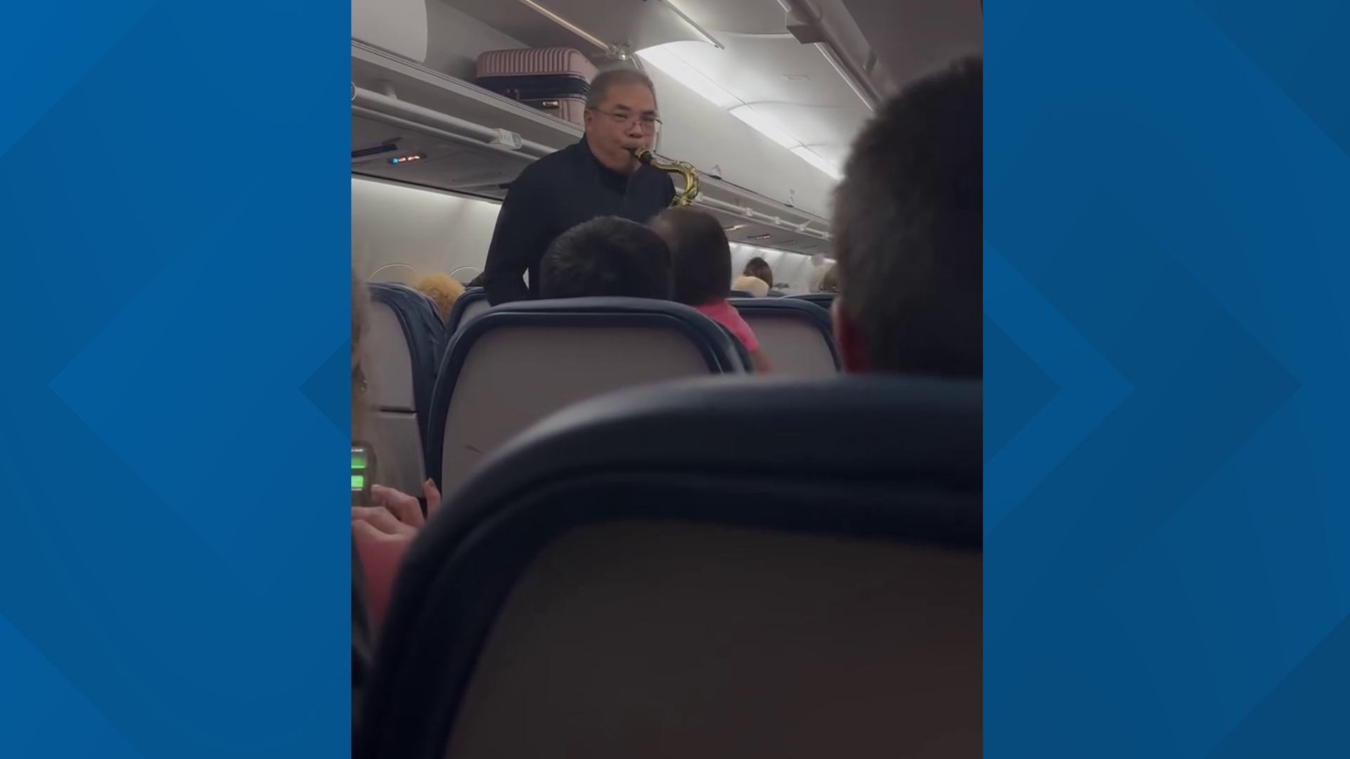 During a delayed Atlanta flight, a man's love for music and making people happy showed unity during the holiday season.