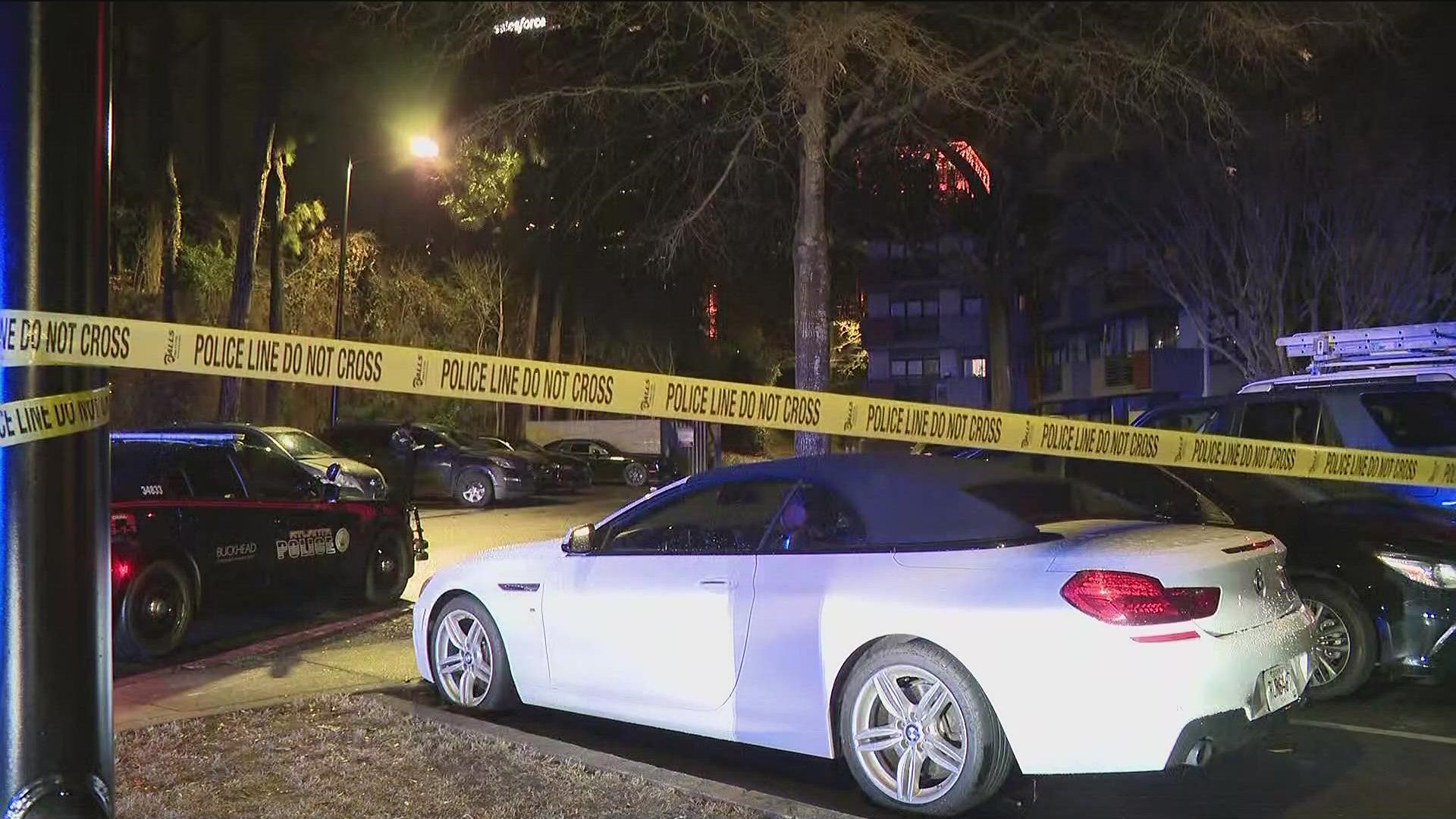 A father and son were shot early Friday morning in the parking lot of a Buckhead apartment complex, according to Atlanta Police.