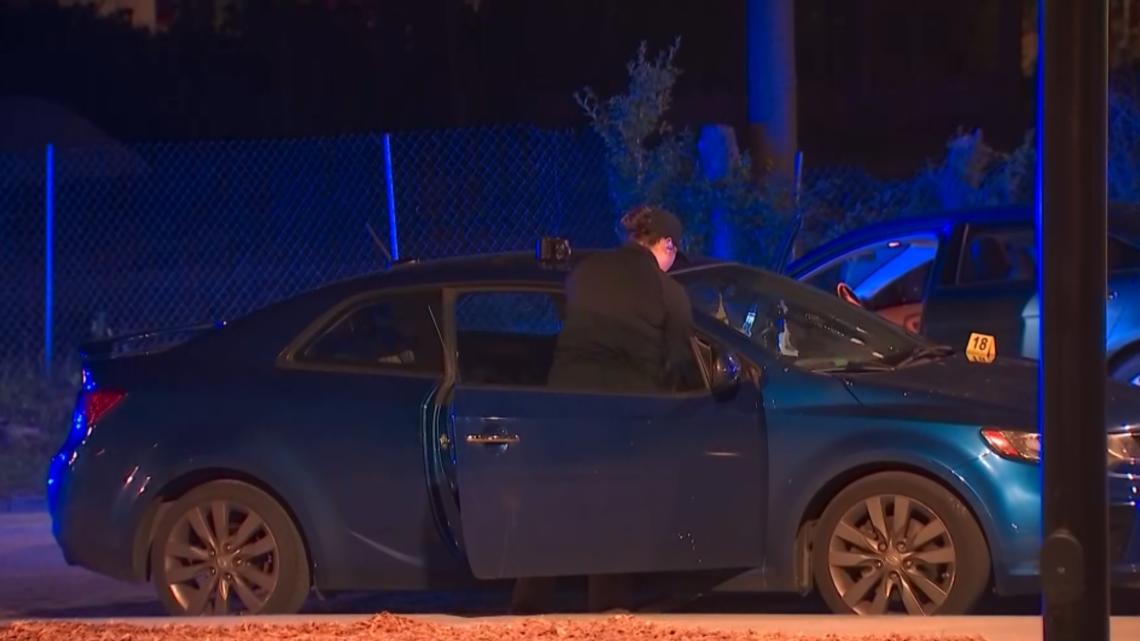 Woman says dispute over dog led to her car being shot up with 4-year-old still inside
