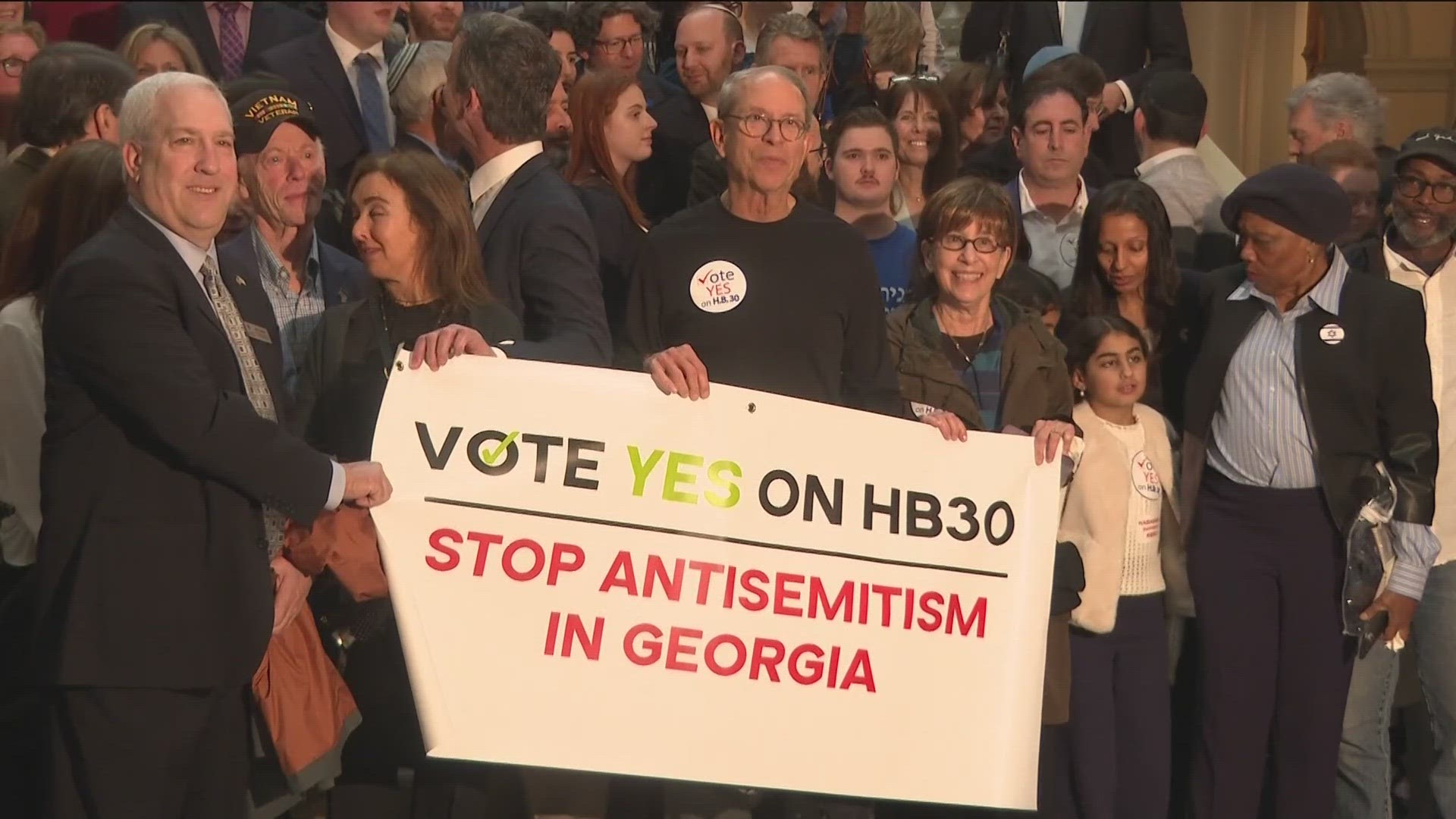 Over a hundred people were queued up for seats in the Senate gallery in anticipation of the vote on HB 30.