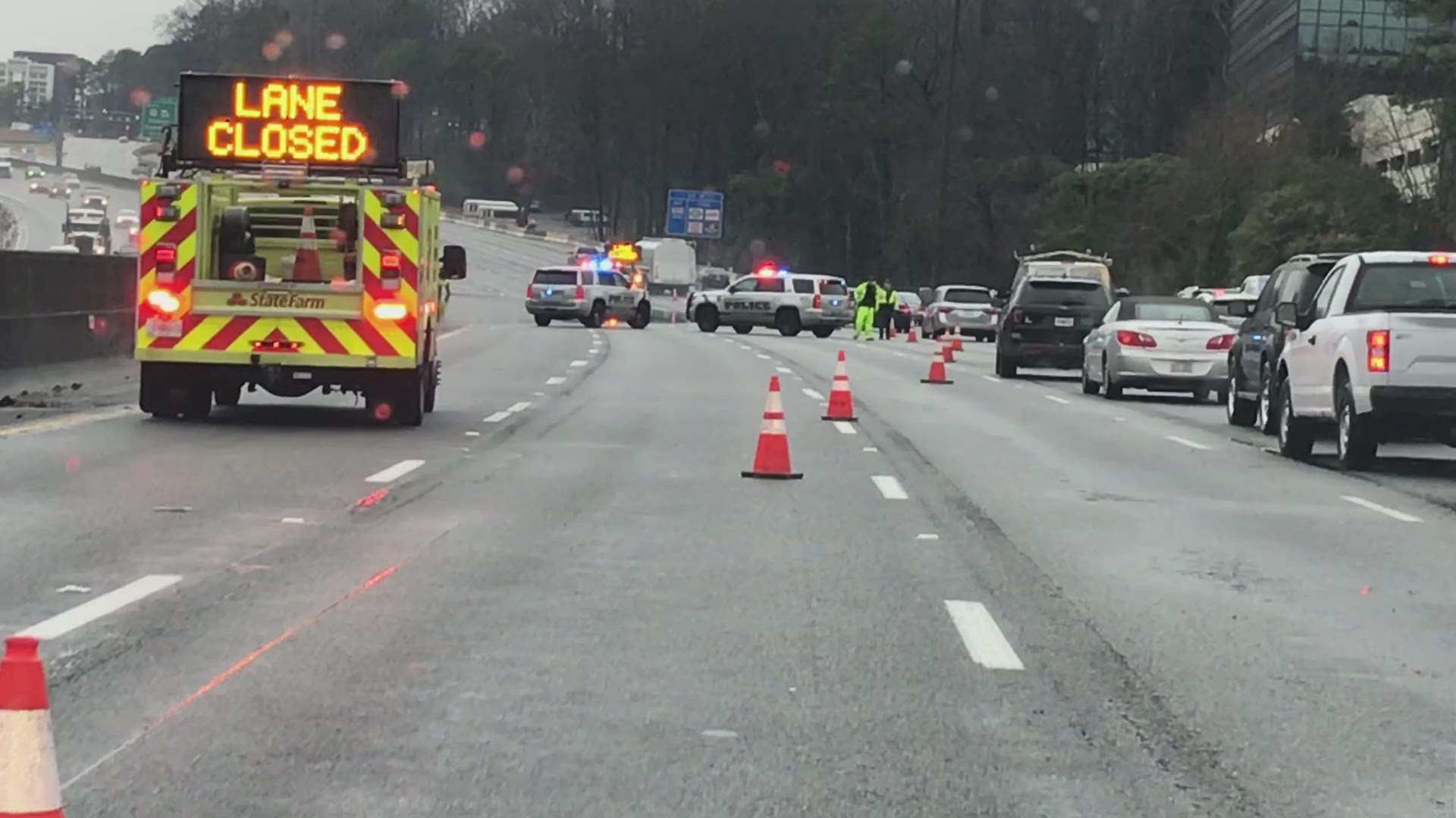 Heavy rains left flooded roads around the Atlanta area on Friday morning.