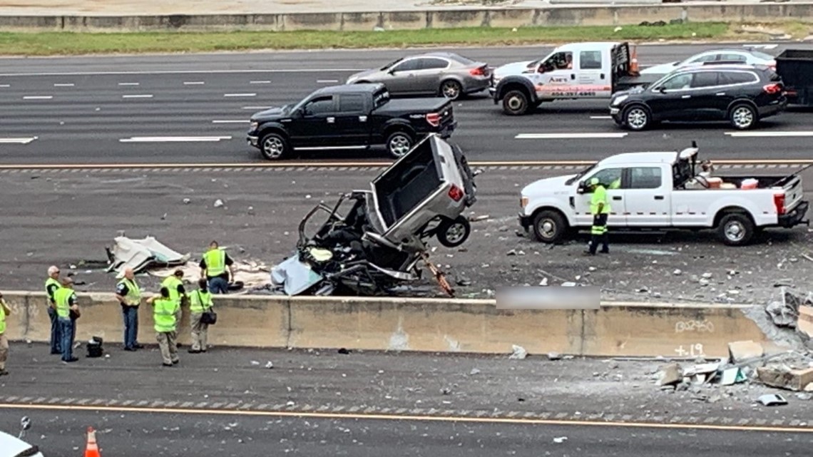 Truck crashes off overpass onto I75 in Cobb County