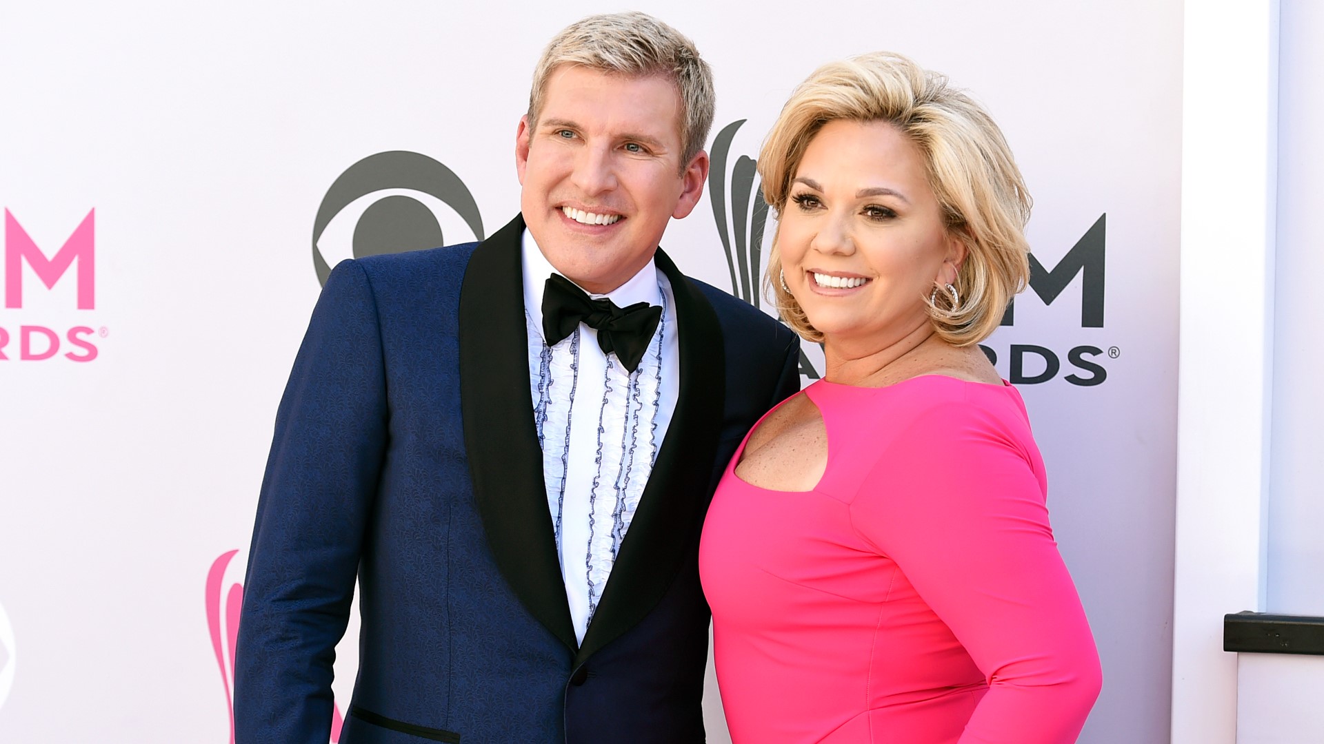 Reality TV stars Todd and Julie Chrisley were sentenced Monday to lengthy prison terms after being convicted earlier this year of bank fraud and tax evasion.