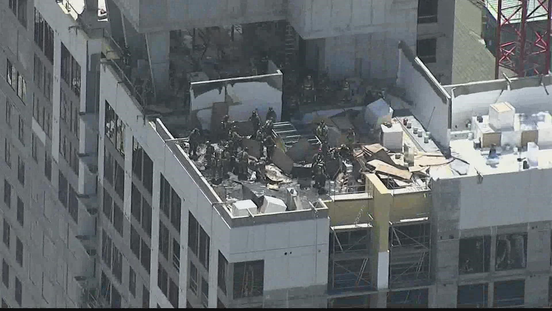A fire broke out Wednesday afternoon on the roof of a student housing high-rise building under construction in downtown Atlanta, fire officials said.