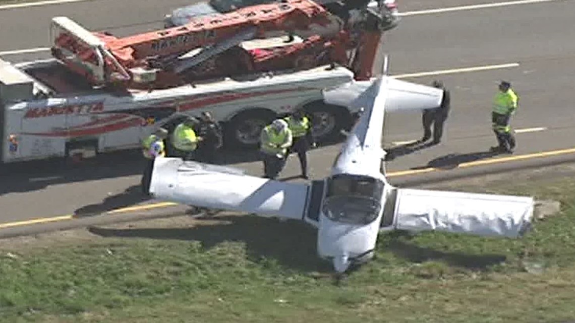 Small plane crash lands on Cobb Parkway