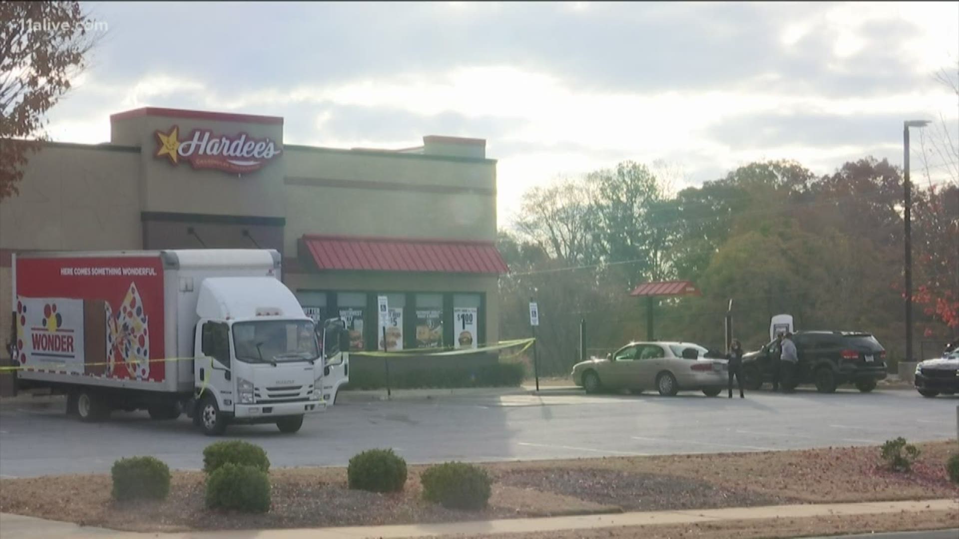 A bread truck driver who happened across the robbery retrieved a gun from his truck and shot the would-be robber, the sheriff said.