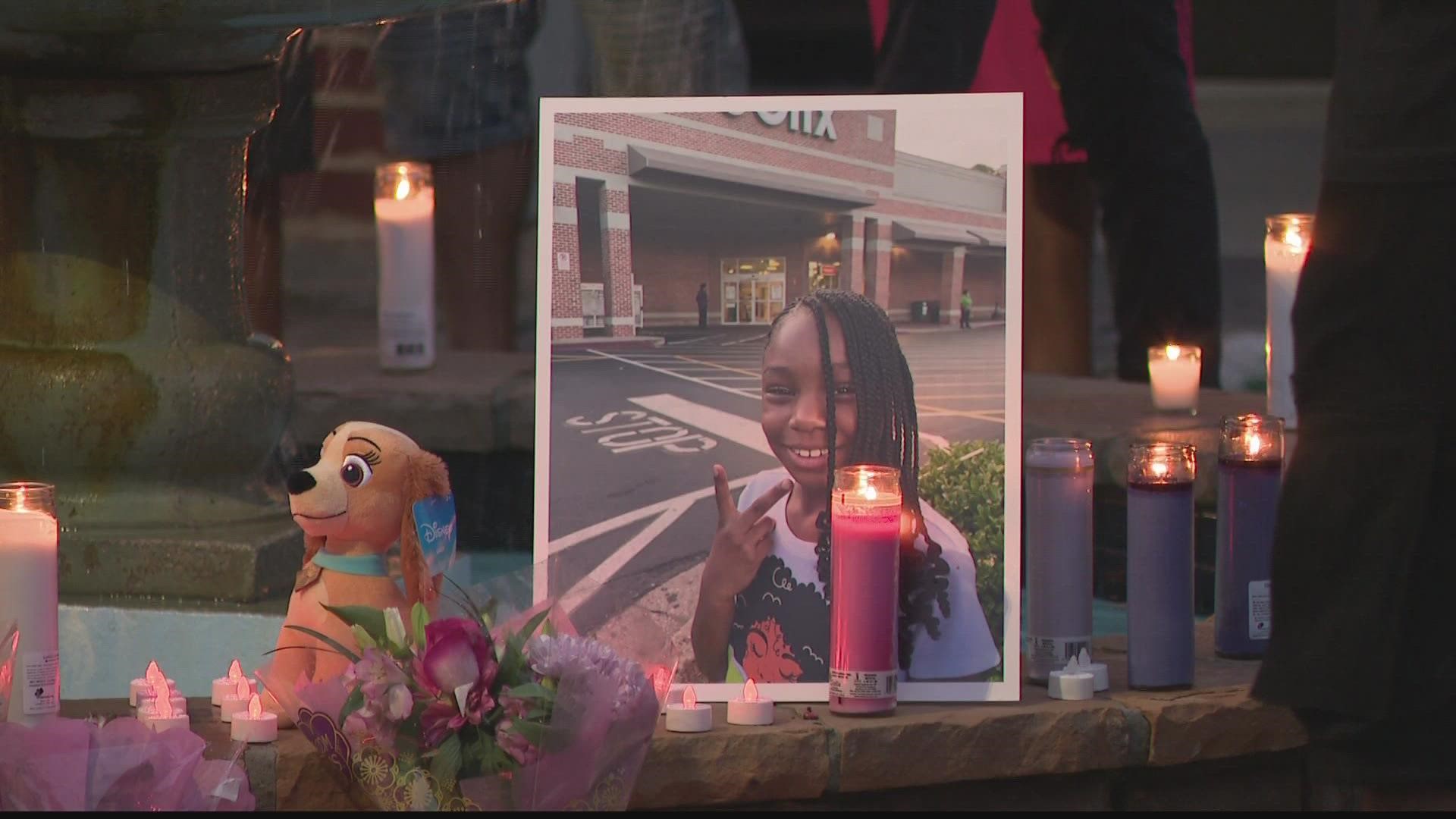 Vigil held at apartment complex where 7-year-old girl was killed