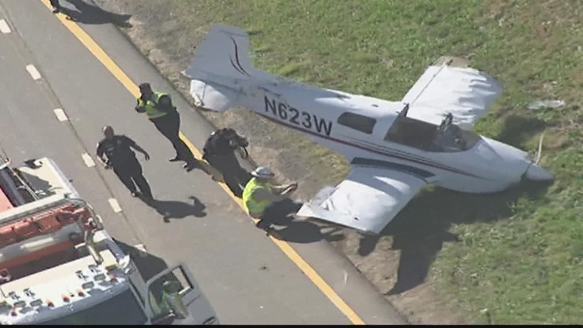 A stretch of Cobb Parkway became a makeshift runway when a small aircraft was forced to make an emergency landing.