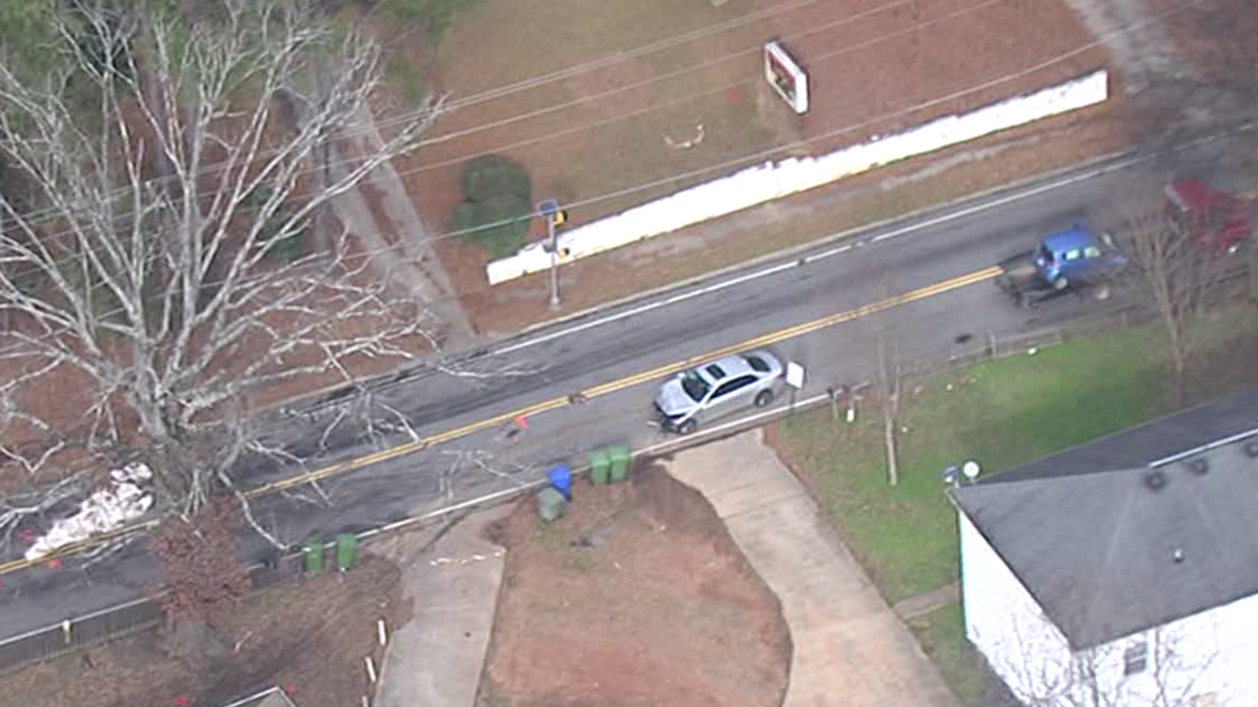 Joseph E. Boone stolen car head on crash in northwest Atlanta