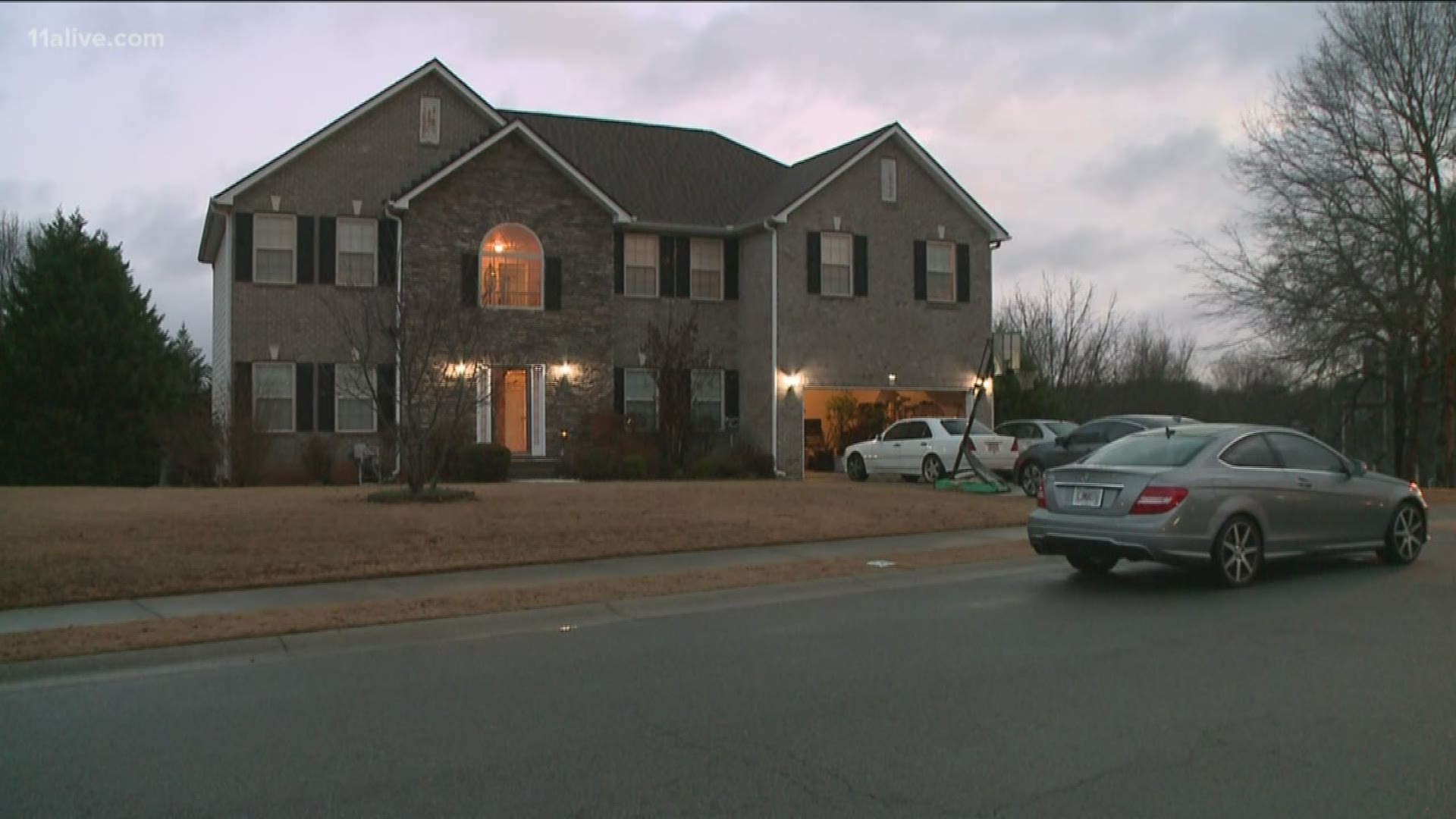 Investigators said that a family member found the two victims shot to death in a bedroom.
